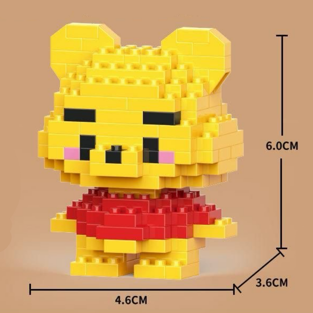 Cute Winnie the Pooh micro brick figure wearing a red shirt. Yellow bear diamond block construction set for adults and teens, 144 pieces with measurements on a brown background